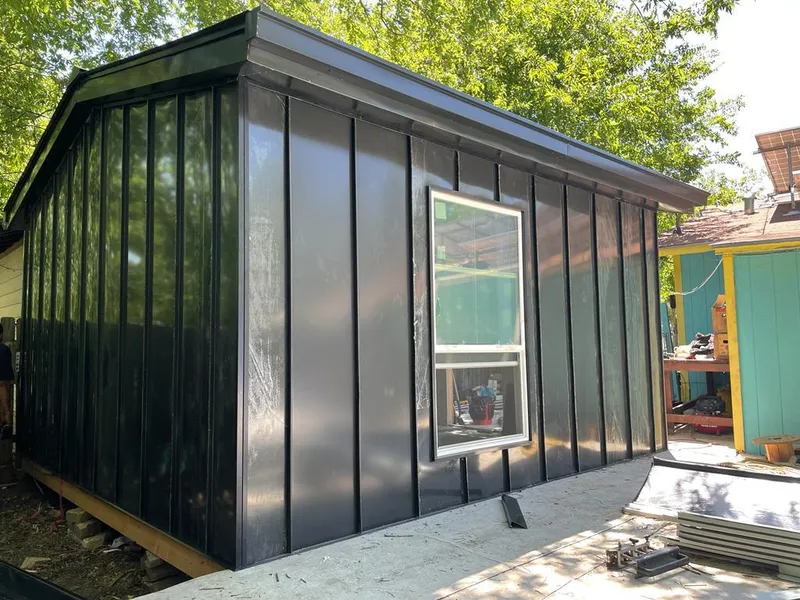 Black standing seam metal wall panels for Metal Roof Installation in Millburn