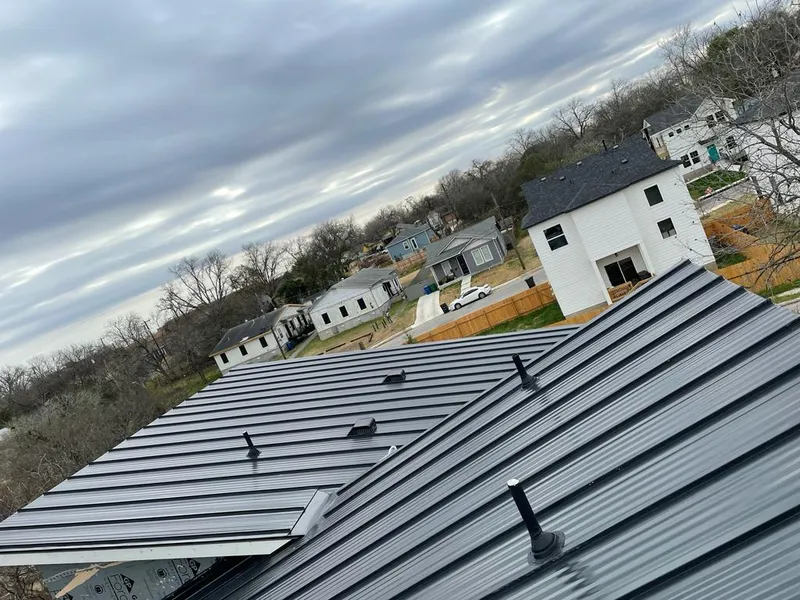 Standing seam metal roof panels with vents for Skylight Repair in Millburn